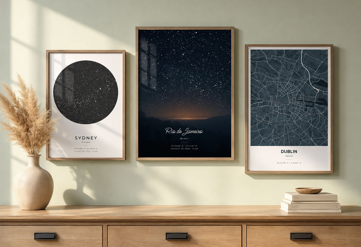 Star map and city map posters framed together on a wall