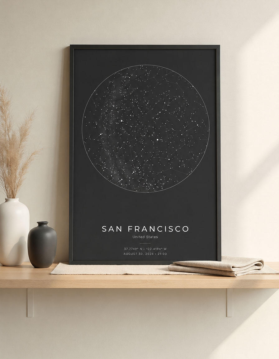 Framed custom star map poster styled on a wooden shelf
